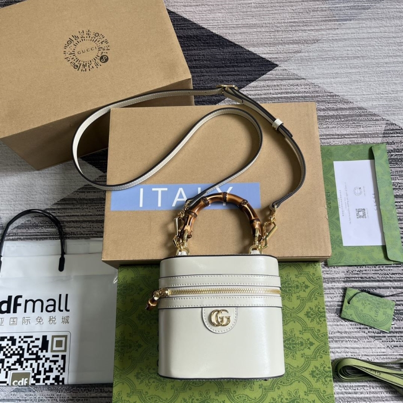 G*u*i cosmetic bags
